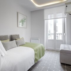 Апартаменты San Juan Apartment by FeelFree Rentals комната для гостей
