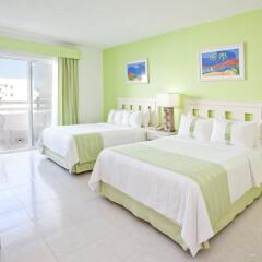 Отель Holiday Inn Cancun Arenas Мексика, Канкун - отзывы, цены и фото номеров - забронировать отель Holiday Inn Cancun Arenas онлайн комната для гостей