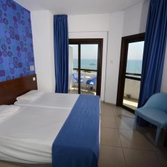 Отель Les Palmiers Beach Hotel Кипр, Ларнака - 4 отзыва об отеле, цены и фото номеров - забронировать отель Les Palmiers Beach Hotel онлайн комната для гостей фото 5