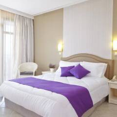 Отель Alia Palace Luxury Hotel and Villas Греция, Пефкохори - 1 отзыв об отеле, цены и фото номеров - забронировать отель Alia Palace Luxury Hotel and Villas онлайн комната для гостей фото 2