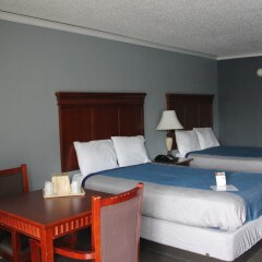 Отель Quarters Inn & Suites комната для гостей