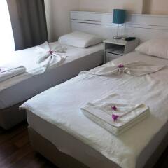 Urkmez Hotel Турция, Сельчук - отзывы, цены и фото номеров - забронировать отель Urkmez Hotel онлайн комната для гостей