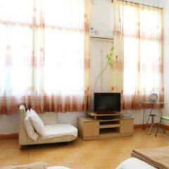 Апартаменты Xingyuan Apartment Сямынь комната для гостей фото 5