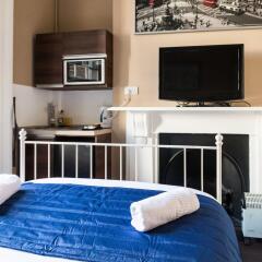 Oyo Belgravia Hotel удобства в номере