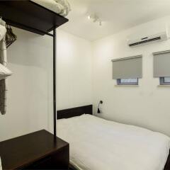 Апартаменты Hanasi 129 - Boutique Apartments Хайфа сейф в номере