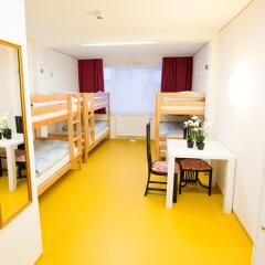 a&t Holiday Hostel удобства в номере фото 2