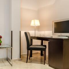 Hotel Exe Suites 33 удобства в номере