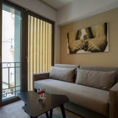 Отель Fos DownTown Suites Афины комната для гостей фото 17