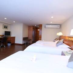 Yihe Hotel Ouzhuang сейф в номере