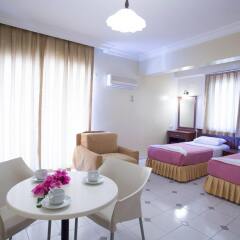 Апартаменты Amaris Apartments комната для гостей фото 5