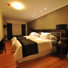 Amerian Executive Cordoba Hotel комната для гостей