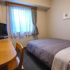Отель Route-Inn Oita Ekimae Ойта комната для гостей фото 3