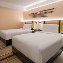 Отель DoubleTree by Hilton Bangkok Ploenchit Бангкок комната для гостей фото 16