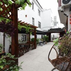 Отель Zhouzhuang Chen jia compound boutique inn