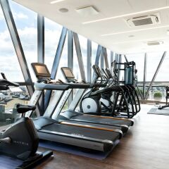 Отель AC Hotel by Marriott Riga Латвия, Рига - 5 отзывов об отеле, цены и фото номеров - забронировать отель AC Hotel by Marriott Riga онлайн фитнесс-зал фото 3