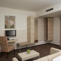Отель H+ Hotel München Германия, Мюнхен - отзывы, цены и фото номеров - забронировать отель H+ Hotel München онлайн комната для гостей фото 2