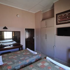 Premier Guest Lodge in Victoria Falls, Zimbabwe from 122$, photos, reviews - zenhotels.com guestroom