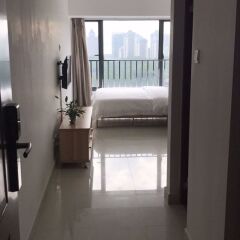 Отель Estay Apartment Xiangmi Lake Shenzhen Китай, Шэньчжэнь - отзывы, цены и фото номеров - забронировать отель Estay Apartment Xiangmi Lake Shenzhen онлайн интерьер отеля