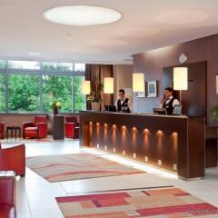 Отель Crowne Plaza Lyon - Cite Internationale Франция, Лион - 1 отзыв об отеле, цены и фото номеров - забронировать отель Crowne Plaza Lyon - Cite Internationale онлайн интерьер отеля фото 2