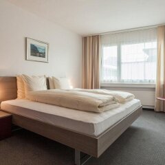 Апартаменты EMA house Serviced Apartments, Aussersihl Цюрих комната для гостей фото 2