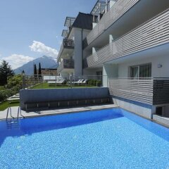 Отель Residence Amelia Тироло бассейн