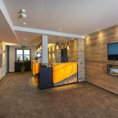 Отель Aparthotel Bergland Австрия, Зёлль - отзывы, цены и фото номеров - забронировать отель Aparthotel Bergland онлайн интерьер отеля