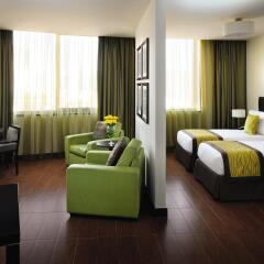 Movenpick Hotel Apartments Al Mamzar Dubai комната для гостей фото 3