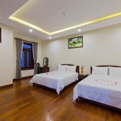 Отель Green Hill Villa Хойан сейф в номере