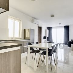 Апартаменты The Village Apartments Буджибба