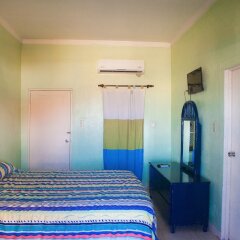 Отель Caribic House Hotel Ямайка, Монтего-Бей - отзывы, цены и фото номеров - забронировать отель Caribic House Hotel онлайн комната для гостей