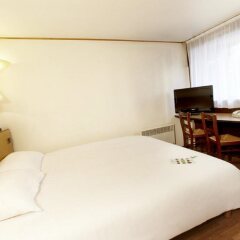 Отель Campanile Hotel & Restaurant Amsterdam Zuid-Oost Нидерланды, Амстердам - 6 отзывов об отеле, цены и фото номеров - забронировать отель Campanile Hotel & Restaurant Amsterdam Zuid-Oost онлайн комната для гостей