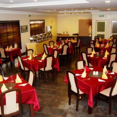 Отель Grand Inn & Suites