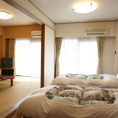 Condominium Hotel Garland Court Usami Ито комната для гостей фото 3