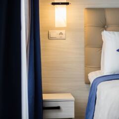 Antares Apart Hotel Львов комната для гостей фото 5