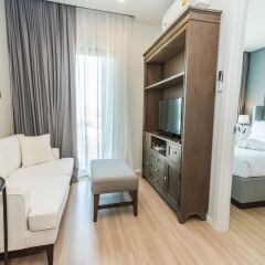 Отель Dlux Condominium Таиланд, Бухта Чалонг - отзывы, цены и фото номеров - забронировать отель Dlux Condominium онлайн комната для гостей