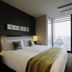 Отель Oakwood Premier Tokyo сейф в номере
