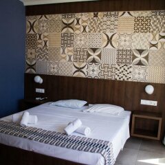 Отель Stalis Blue Sea Front Deluxe Rooms комната для гостей