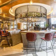 Отель Ascott Raffles Place Singapore гостиничный бар