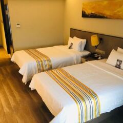 Отель Home Inn Plus (Xi'an South Second Ring 4th Gaoxin Road) Китай, Сиань - отзывы, цены и фото номеров - забронировать отель Home Inn Plus (Xi'an South Second Ring 4th Gaoxin Road) онлайн комната для гостей фото 2