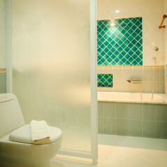 Отель The Green Beach Resort ванная фото 2