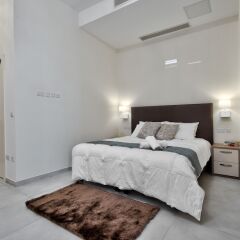 Отель The Suites - Piazza Kirkop Мальта, Киркоп - отзывы, цены и фото номеров - забронировать отель The Suites - Piazza Kirkop онлайн комната для гостей