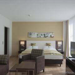 Отель Holiday Inn Munich-Unterhaching Германия, Унтерхахинг - 7 отзывов об отеле, цены и фото номеров - забронировать отель Holiday Inn Munich-Unterhaching онлайн комната для гостей фото 5