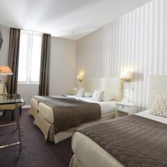 Отель Hôtel Des Batignolles Франция, Париж - 10 отзывов об отеле, цены и фото номеров - забронировать отель Hôtel Des Batignolles онлайн комната для гостей фото 2