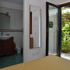 Отель Il Roseto B&B Равелло сейф в номере