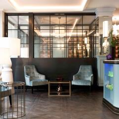 Отель Rotary Geneva MGallery by Sofitel Швейцария, Женева - отзывы, цены и фото номеров - забронировать отель Rotary Geneva MGallery by Sofitel онлайн интерьер отеля