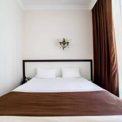 Corona Hotel & Apartments комната для гостей