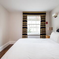 Апартаменты Tavistock Place Apartments Лондон комната для гостей фото 4
