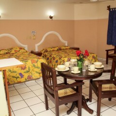 Отель Blue Pacific Suites питание