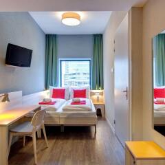 Отель MEININGER Hotel Amsterdam City West Нидерланды, Амстердам - 1 отзыв об отеле, цены и фото номеров - забронировать отель MEININGER Hotel Amsterdam City West онлайн комната для гостей фото 2