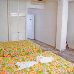 Hotel Corona Zihuatanejo комната для гостей фото 2
